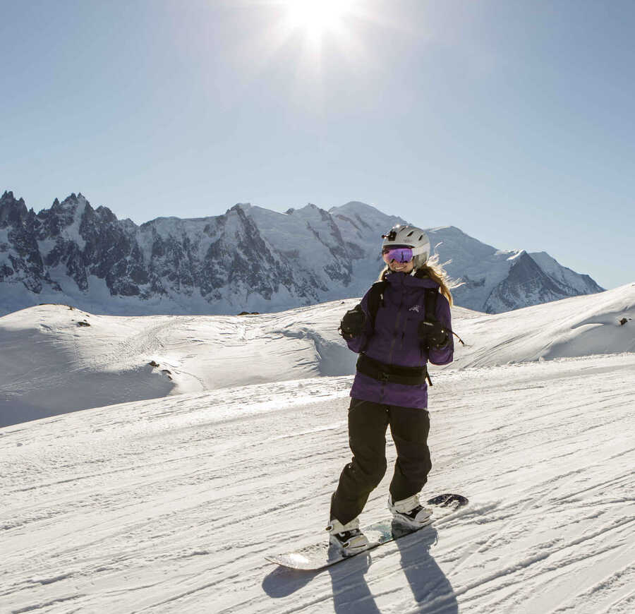 A snowboarder on a solo snowboard week