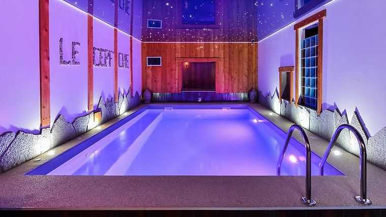 The swimming pool in our luxury solo ski chalet