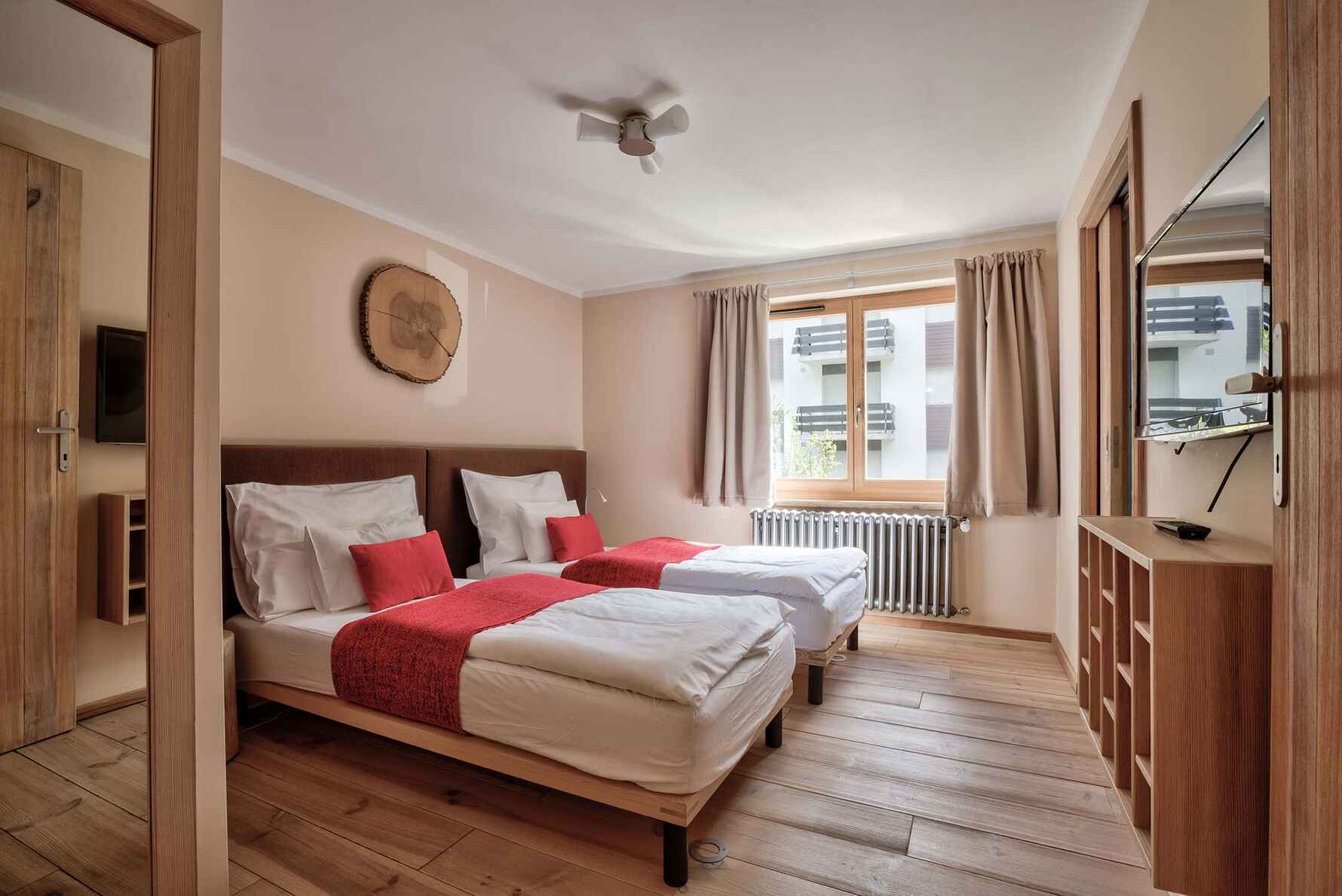 A bedroom in our flaghip solo ski chalet