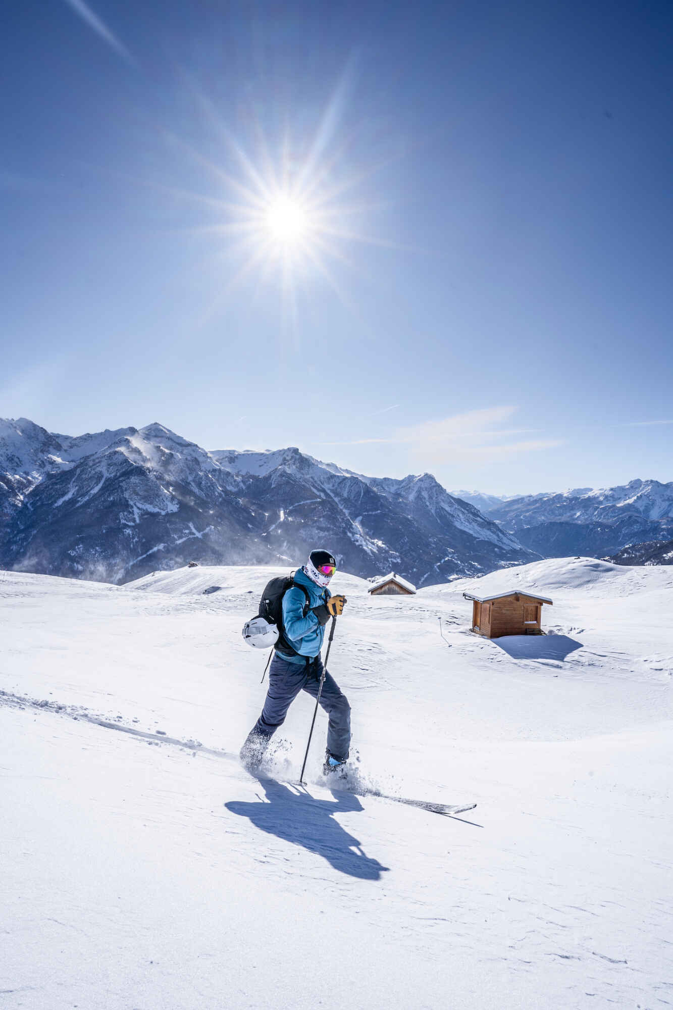 A solo skier ski touring in Serre Chevalier